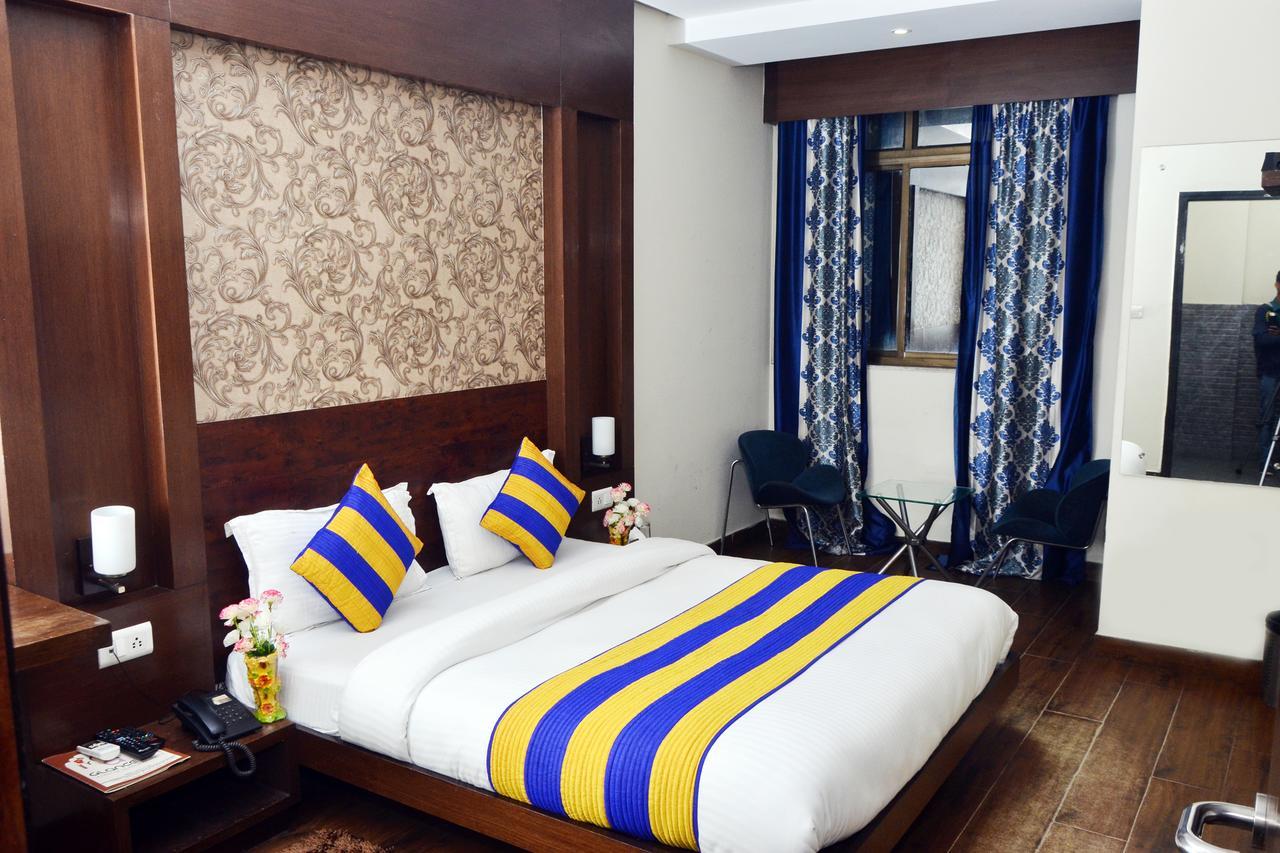 Oyo 18753 Hotel Glance Inn Yeni Delhi Dış mekan fotoğraf